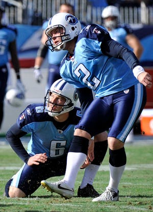 Frederick Breedon/The Associated PressTennessee Titans kicker Rob Bironas (2) and holder Brett Kern watch Bironas’ 51-yard field goal in the first quarter Saturday against the Jacksonville Jaguars. The former Georgia Southern kicker set an NFL record with the kick, giving him a field goal of 40 yards or longer in nine straight games.