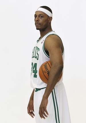 Celtics basketball player Paul Pierce poses for a photo during Celtics media day in Waltham earlier this month.