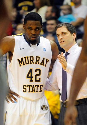 Murray State's first-year head coach, Steve Prohm, shown talkiing to player Ivan Aska, has the Racers off to a 13-0 start.