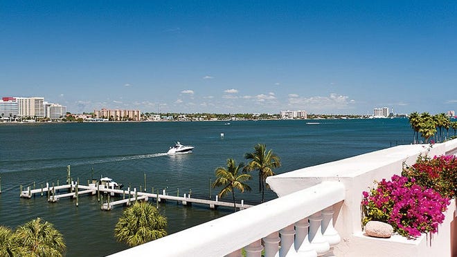 The balcony of the south penthouse at the Parc Regent wraps around three sides of the building and offers views of the Intracoastal Waterway among its vistas. The condominium sold this week for a recorded $5.48 million.