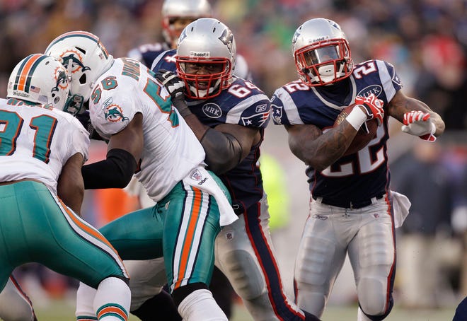 Patriots running back Stevan Ridley (finds a hole in the Miami Dolphins defensive line during the first quarter of the Pats' win on Dec. 23 at Gillette Stadium.