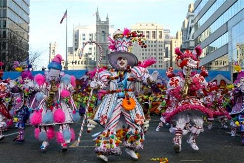 People participate in the Mummers Parade in Philadelphia, on
Sunday, Jan. 1, 2012. The parade, often compared to Mardi Gras, is
a century-old tradition featuring elaborately festooned musicians,
comics and other performers. (AP Photo/Joseph Kaczmarek)