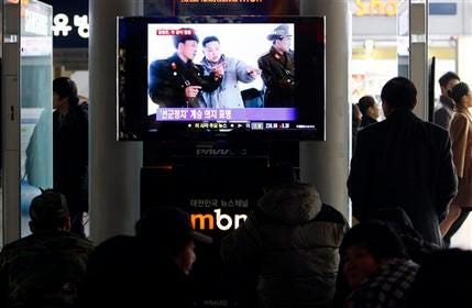 People watch a TV screen reporting about North Korea's next leader Kim Jong Un, at the Seoul Train Station in Seoul, South Korea, Monday, Jan. 2, 2012. South Korea's president opened the door Monday to possible nuclear talks with North Korea and warned the neighboring country to avoid any provocations, saying the Korean peninsula is at a crucial turning point.