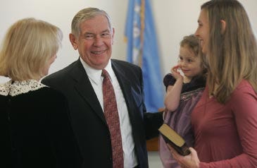 Photos by Daniel Freel/New Jersey Herald - Newly sworn in Frankford Township Committeeman James Ayers, second from left, is surrounded by his wife, Lana Ayers, left, daughter, Serena Ayers, right, and two-year-old granddaughter, Violet Baker.