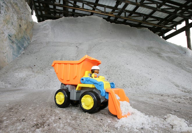 The toy truck in the foreground with the mountain of salt in the Massillon storage barn illustrates the minimal amount used thus far.