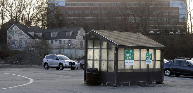 Park and Ride off Rte. 9 opposite California Avenue in Framingham. The historic but boarded-up Rugg-Gates House, a circa-1774 Georgian-style home on Gates Street, can been seen in the background.