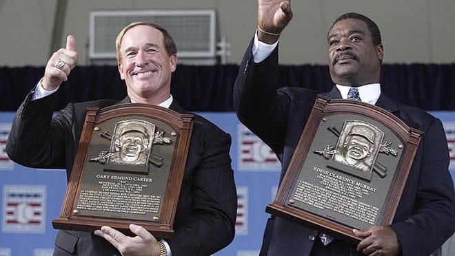 Gary Carter (left) stands with Eddie Murray at the 2003 induction ceremony for the National Baseball Hall of Fame. Carter, a Palm Beach Gardens resident, played 19 years in the major leagues.