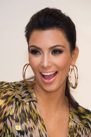 In this Sept. 21, 2011 file photo, Kim Kardashian appears at Bloomingdale’s to promote her Belle Noel jewelry line, in New York. An online video from the Courage Campaign targets the star of “Keeping Up with the Kardashians” and “Kourtney and Kim Take New York” as part of its campaign for a proposed November ballot initiative to raise taxes on the wealthiest Californians. (AP Photo/Charles Sykes, File)