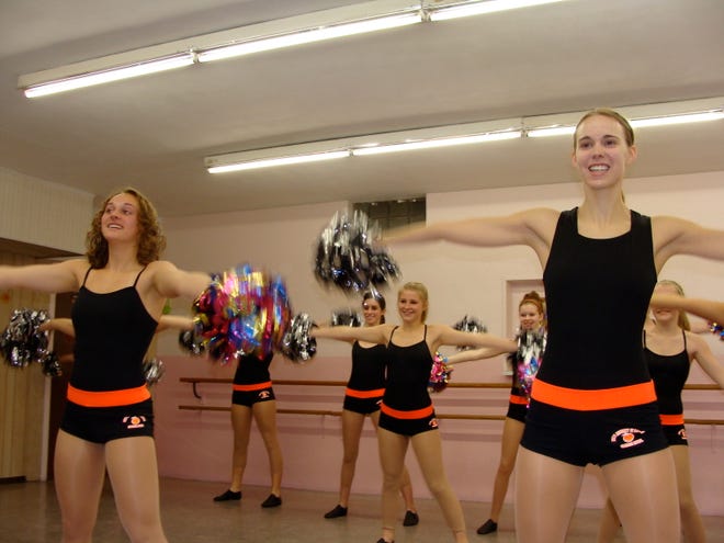 Four Woodford County girls are in Miami to dance in the Orange Bowl tonight.