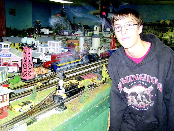 Jared Brake, 18, has been a member of the Waynesboro Model Railroad Club for four years.The puffing engine gets its smoke from a special blend of kerosene. Brake and other members of the club will be present for the open houses in January, eager to answer questions and point out features.
