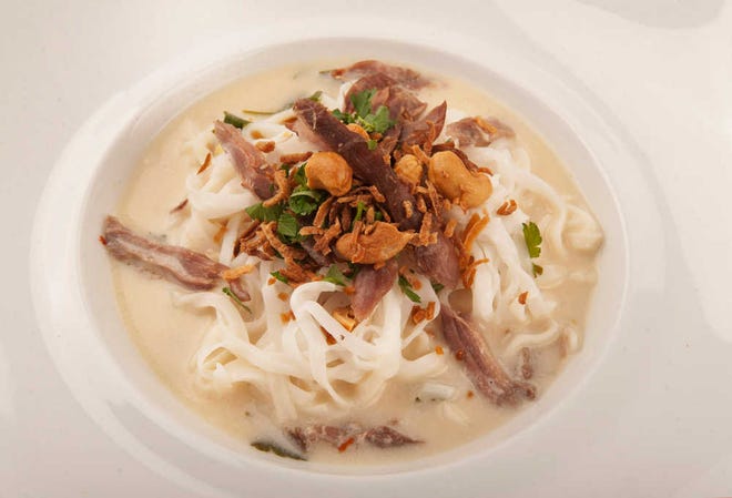 Hot Duck and Coconut Noodles is tasty and crunchy at the same time. ( Photo for The Washington Post by Matt McClain.)