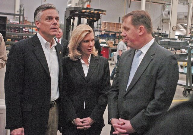 John Huff/Staff photographer 
Presidential candidate Jon Huntsman takes a tour of Goss International with his wife, Mary Kaye, and CEO Jochen Meissner at their Durham facility Thursday during a campaigning tour of the Seacoast region.