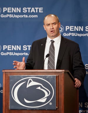 Penn State's new football coach Bill O'Brien addresses the media after he was introduced during an NCAA college football news conference, Saturday, Jan. 7, 2012, in State College, Pa. O'Brien, who is currently the offensive coordinator for the New England Patriots, replaces Hall of Famer Joe Paterno, fired Nov. 9 in the aftermath of child sex abuse charges against retired assistant coach Jerry Sandusky. (AP Photo/Andy Colwell)