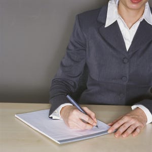 Woman Taking Notes