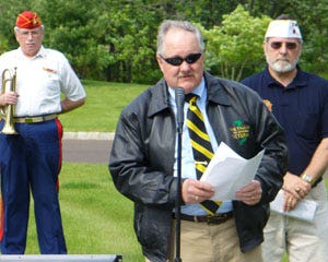 Bill Severns reads POW-MIA tribute.
