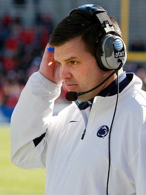 Penn State assistant coach Jay Paterno signals a play during the first half of the TicketCity Bowl NCAA college football game against Houston, Monday, Jan. 2, 2012, at the Cotton Bowl in Dallas. Houston won 30-14. (AP Photo/Brandon Wade)