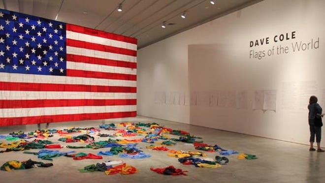 Dave Cole's Flags of the World exhibit at the Norton Museum of Art -- a 15-foot-by-28.5-foot American flag made by cutting out the red, white and blue in the flags of the remaining 192 nations that make up the United Nations -- has drawn controversy from art lovers.