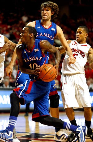 Tyshawn Taylor scored 15 points and dished five assists Wednesday night as Kansas cruised to an 81-46 victory at Texas Tech.