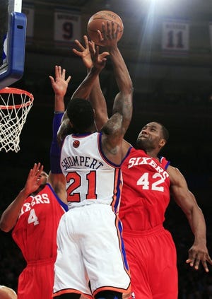 Frank Franklin II / AP Photo 
 The Sixspan class=”highlight”>ers/span>‘ Elton Brand (42)
blocks the shot of the Knicks’ Iman Shumpert during Wednesday’s
game aty Madison Square Garden.