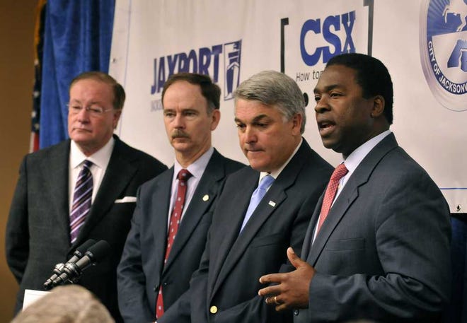 Will.Dickey@jacksonville.com--10/31/11--CSX executive vice-president Clarence W. Gooden, Florida Rep. Lake Ray, JAXPORT CEO Paul Anderson and Mayor Alvin Brown answer questions after an announcement about a TIGER grant being sought for a new intermodal container transfer facility at Dames Point Monday, October 31, 2011 in Jacksonville, Florida. (The Florida Times-Union, Will Dickey)