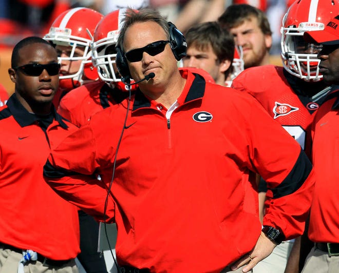 Georgia coach Mark Richt watches his team play Michigan State during the Outback Bowl NCAA college football game Monday, Jan. 2, 2012, in Tampa, Fla. (AP Photo/Chris O'Meara)