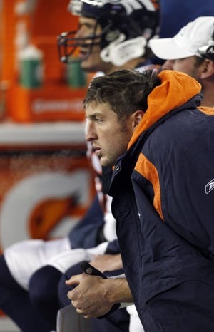 Broncos QB Tim Tebow's run came to an end in the cold of
Foxborough, Mass., on Saturday.