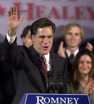 In this Nov. 5, 2002, file photo, Massachusetts Republican gubernatorial candidate Mitt Romney waves to supporters in Boston. (AP Photo/Steven Senne, File)