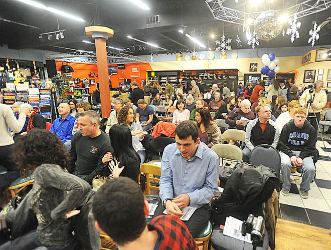 People packed the house of Rick's Music World in Raynham for the Muscular Dystrophy Association benefit concert "Making Music for MDA" on Saturday, Jan. 14, 2012.