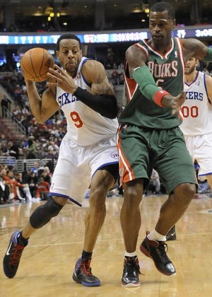 The Sixers' Andre Iguodala drives against the Bucks' Stephen
Jackson during the first half of Monday's 94-82 victory at the
Wells Fargo Center.