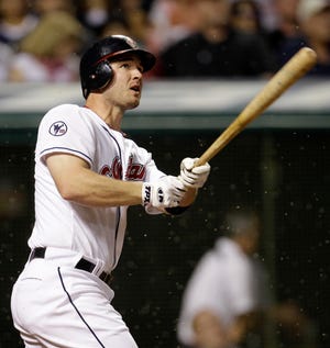 Indians third baseman Jack Hannahan hits one of his two solo home runs during the sixth inning of Wednesday’s game.