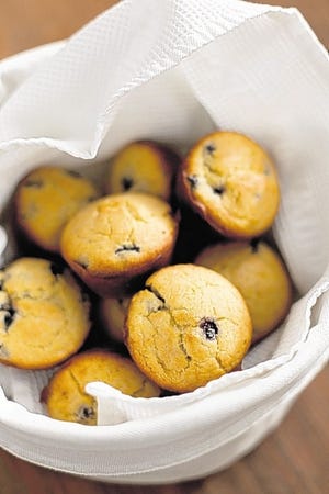 These blueberry corn muffins, photographed in Erica Marcus' Brooklyn apartment, were made with frozen blueberries. (Michael Gross/Newsday/MCT)