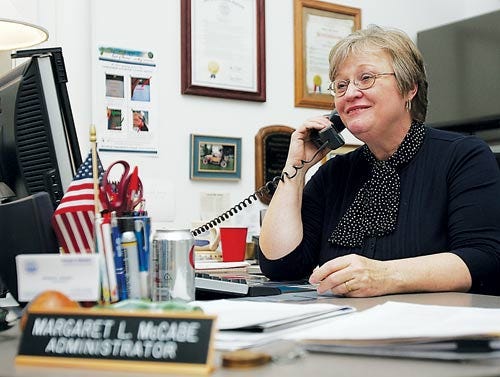 Photo by Tracy Klimek/New Jersey Herald - Sussex County Board of Elections Administrator Marge McCabe is seen Wednesday in her office at the Board of Elections in Newton. McCabe resigned from the Newton Planning Board at Wednesday’s meeting.