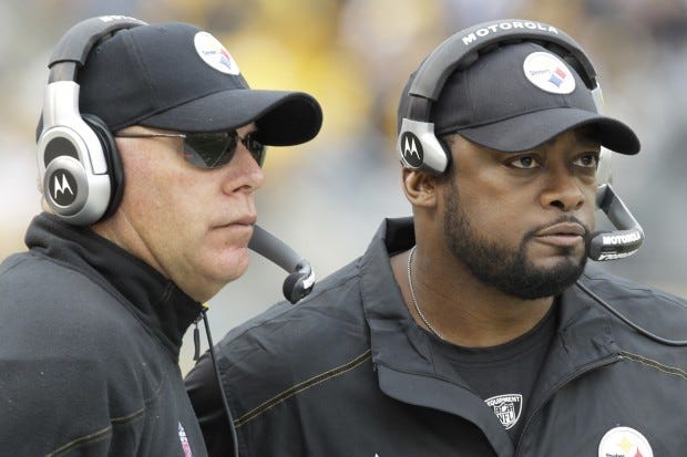 Pittsburgh Steelers head coach Mike Tomlin, right, and offensive
coordinator Bruce Arians watch from the sidelines during the second
quarter of an NFL football game against the Cincinnati Bengals in
Pittsburgh.