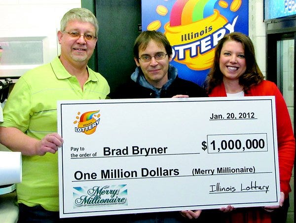 Brad, center, and Dawn Bryner of Kewanee were big winners in the Illinois Lottery’s Merry Millionaire scratch ticket game. At left is Kenny Ryan, owner of Jo Jo’s Convenient Store, where Brad Bryner bought the winning $20 ticket.