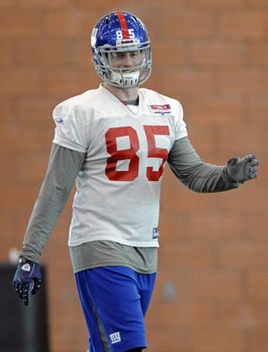 Giants tight end Jake Ballard is listed as questionable for Sunday’s NFC championship after having a nonsurgical procedure performed on his right knee Thursday and sitting out Friday’s practice.