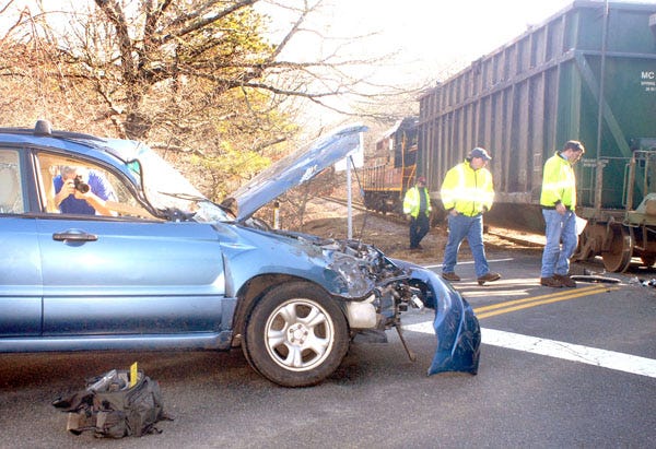 SOUTH YARMOUTH - A 76-year-old woman was taken to Cape Cod Hospital this morning with what were described as minor injuries after the car she was driving collided with a train.