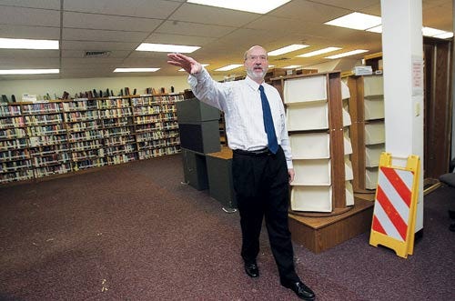Photo by Daniel Freel/New Jersey Herald - Stan Pollakoff, library director, explains the renovations at the Franklin branch of the Sussex County Public Library.