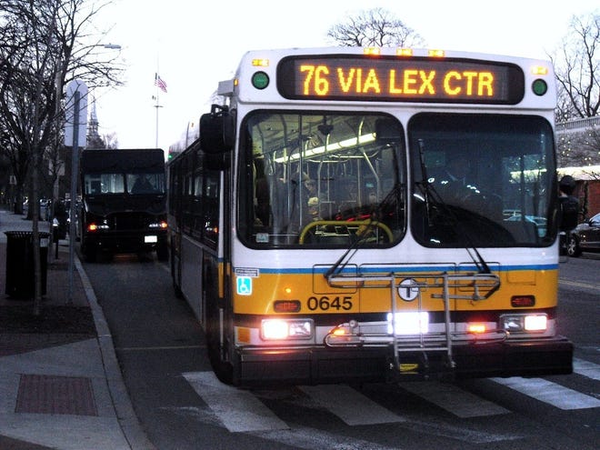 MBTA Bus 76 departs from the Mass. Ave. at Clarke stop in Lexington Center en route to Alewife Station in Cambridge.