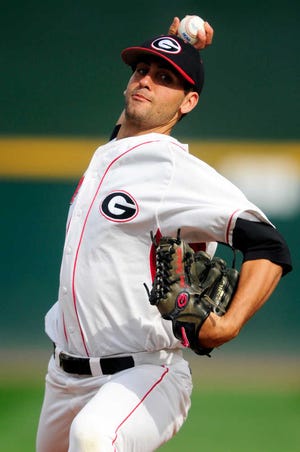 Georgia Bulldogs pitcher Michael Palazzone warms up to pitch in the top of the first as the Georgia Bulldogs beat the Florida Gators 7-2 in an NCAA baseball game on Saturday April 16, 2011 at Foley Field in Athens, Ga. Palazzone gave up one run over eight innings and struck out six. (David Manning/Staff/david.manning@onlineathens.com)