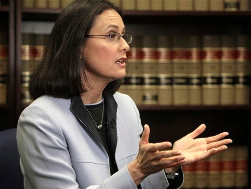 Attorney General Lisa Madigan plans to hire more lawyers to help with FOIA requests. (AP Photo/M. Spencer Green)