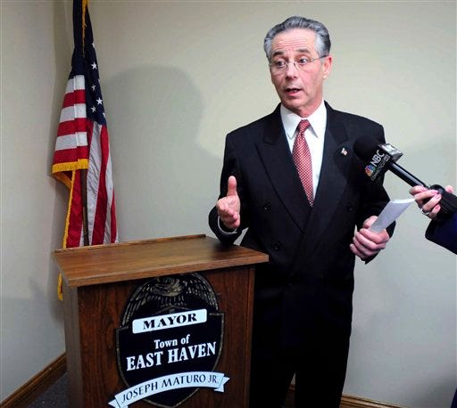 East Haven Mayor Joseph Maturo, Jr., speaks to media in his office in the East Haven, Conn., Town Hall Wednesday, Jan. 25, 2012, where he apologized for saying on Tuesday he "might have tacos" as a way of doing something for those Latino community in his city. Maturo's statement came in response to a reporter's question about the FBI's arrest of the four officers town, under federal scrutiny since the U.S. Department of Justice launched a civil rights probe in 2009 that found a pattern of discrimination and biased policing.