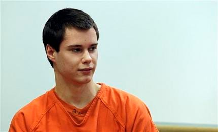 In this Dec. 16, 2011 file photo, Colton Harris-Moore, also known as the "Barefoot Bandit," glances at the courtroom gallery as he walks to the defense table, in Island County Superior Court, in Coupeville, Wash. Harris-Moore is scheduled to be sentenced Friday, Jan. 27, 2012, in a U.S. federal court for his two-year international crime spree of break-ins and boat and plane thefts.