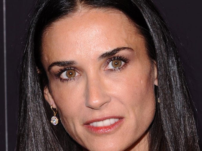 On 911 call, friends say Demi Moore was 'convulsing'