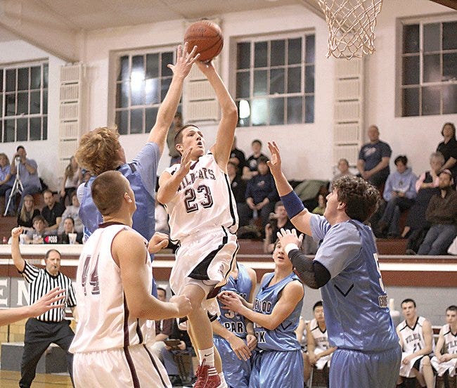 The Howe School’s Conner Geiser glides through the air on his way to the hoop Thursday night.