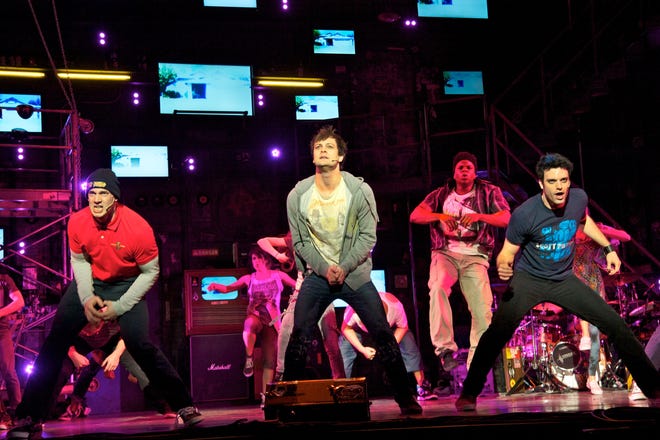 Three friends (Scott J. Campbell, Van Hughes and Jake Epstein) seek something more out of life, and they rock out along the way, in "American Idiot."