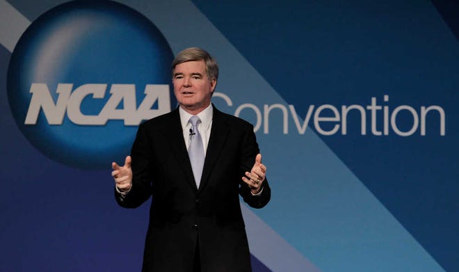 NCAA President Mark Emmert delivers his State of the Association speech during the NCAA's annual convention on Thursday, Jan. 12, 2012, in Indianapolis. (AP Photo/Darron Cummings)