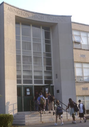Students enter Abington High School.
