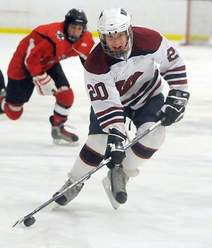 Westborough's Stephen Falvey races up the ice with the puck during the Rangers' 7-3 win over Holliston.