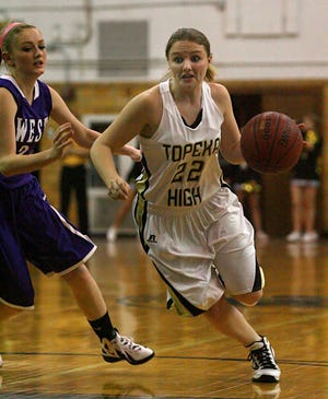 Brianna Madden and the Topeka High Trojans overcame a slow start to get past Shonna Harris and archrival Topeka West, 54-33, on Tuesday night.