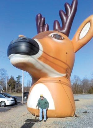 Charles Stine, 90, of Greencastle stands in front of one big 8-point buck outside a sporting goods store in Hughesville, Md. Stine, a World War II and Korean War veteran, was visiting his daughter Linda Hilbert, and her husband, Andy, in Mechanicsville, Md. when this photograph was taken.